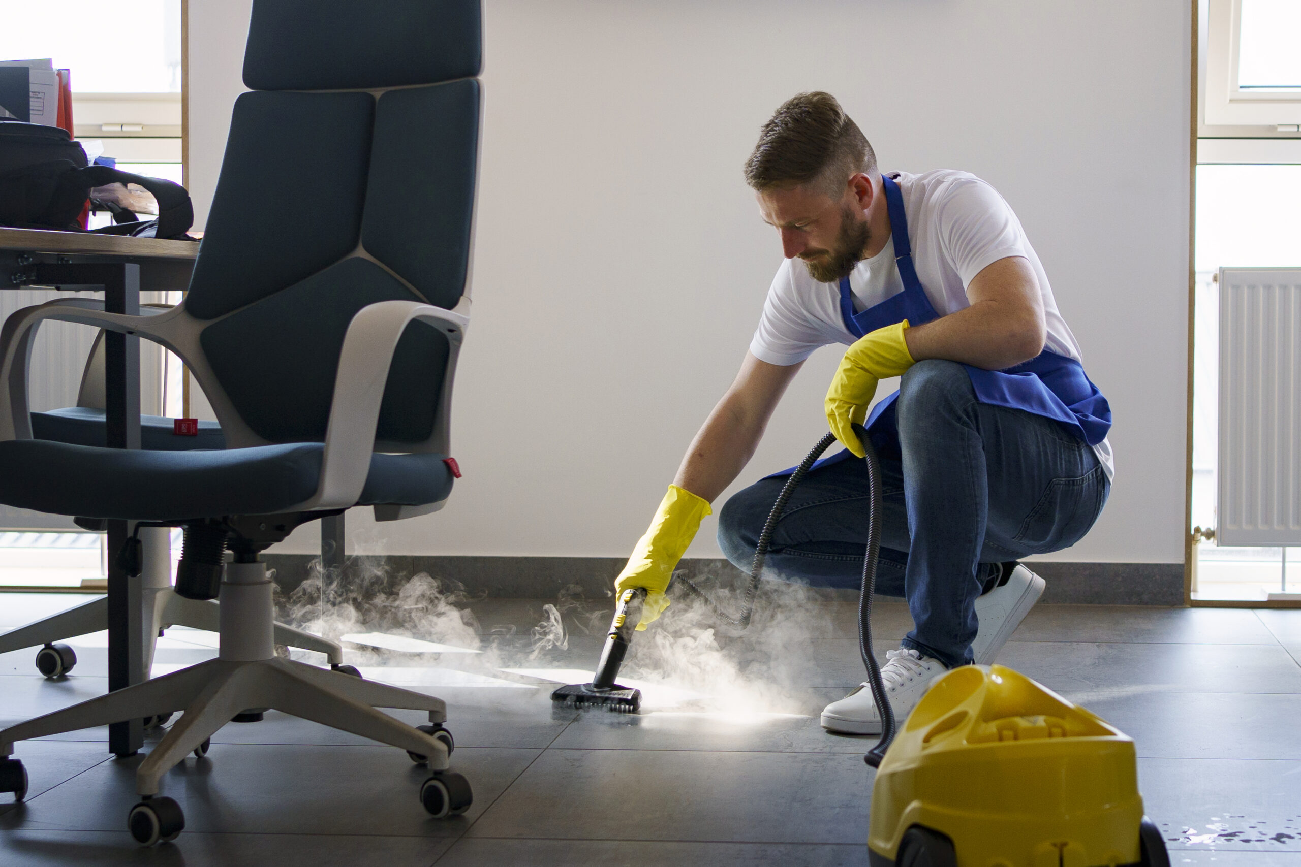 professional-cleaning-service-person-using-steam-cleaner-office (1)